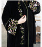 Elegant premium black abaya with colorful floral embroidery showing detailed botanical motifs and roses for modest Islamic fashion