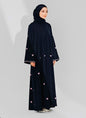 Elegant black embroidered abaya with matching hijab modeled by woman showing modest wear Islamic dress for casual and formal occasions