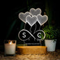 "Personalized LED name lamp with custom engraving glowing on bedside table for anniversary gift"
